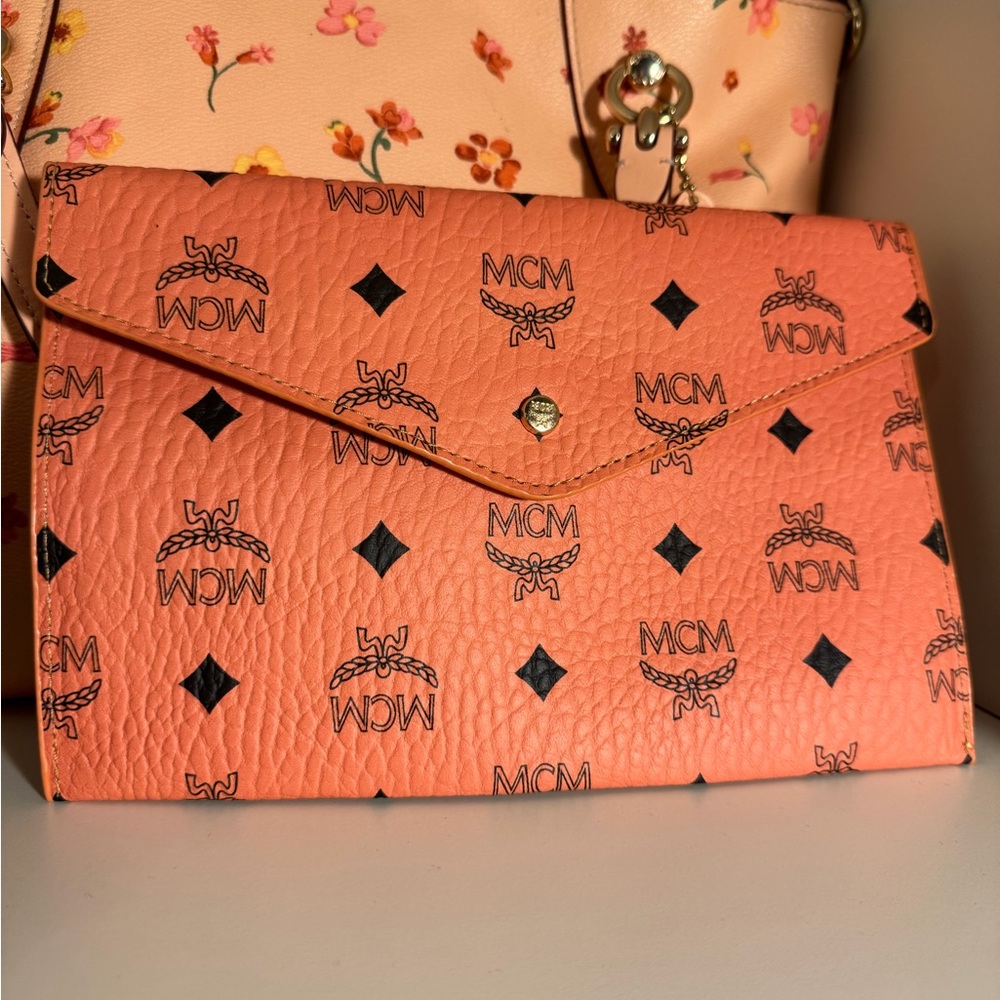 MCM Peach Clutch with Logo Design